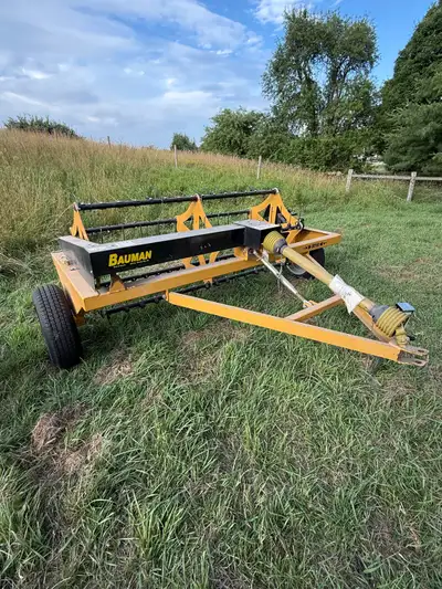 I'm selling a used Bauman 5710 Tedder Bought new Works great to get that hay dry way sooner. Very ge...
