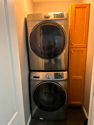 Good working condition front load electric washer and dryer with multi steam. All cycles work on was...