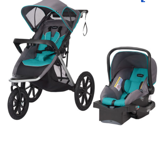 Poussette de jogging  bébé Evenflo avec siège auto 150$ dans Poussettes, porte-bébés et sièges d'auto  à Ville de Montréal - Image 2