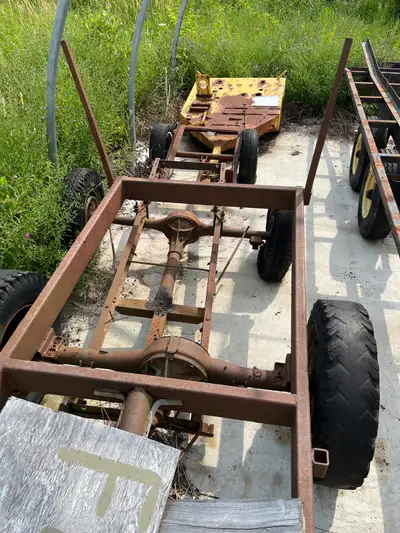 Several used trailers of various sizes.