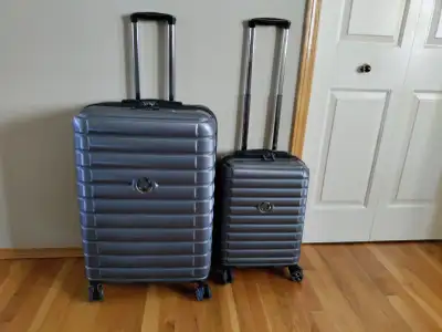 Delsey Paris 2 PCs Hardshell Rolling Luggage set for sale., View more
