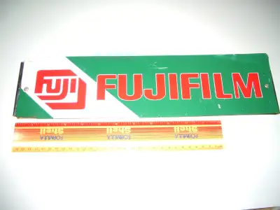 Vintage Metal Fugifilm Sign About 16" X 4" It is two sided but is riveted to a piece of aluminum, as...