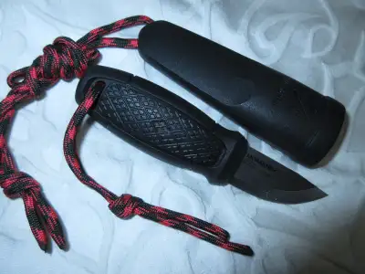 The Mora Eldris neck knife is a short, stout knife designed to be carried around the neck or in a po...