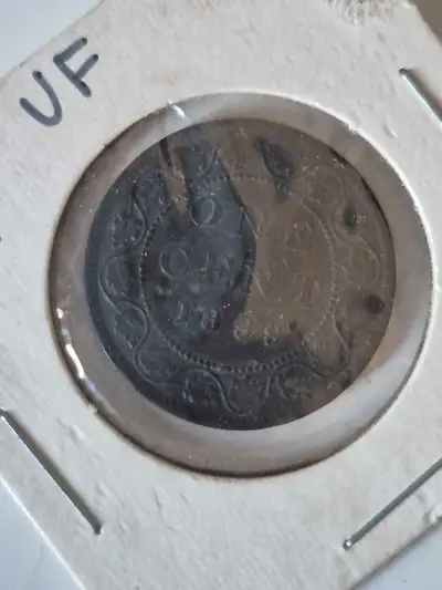 Take a step back in time with this 1858 Canadian one-cent coin, a tangible piece of Canadian history...