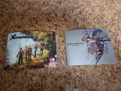 Xenoblade Chronicles and Fire Emblem Awakening Bonus Art Books, View more