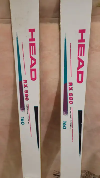 HEAD woman downhill skis, completed with bindings and poles. **Bonus - free ski boots (size 5.5 - 6)