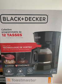 Brand new unopened Black And Decker 12 cup Coffee Maker!