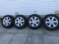 Set Of Four 235/65R18 Goodyear Eagle LS  All Season On Alloy Rim