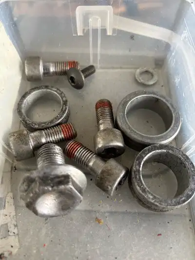 All factory parts: Front and rear axle spacers Axle bolt, stock front brake parts following a stainl...