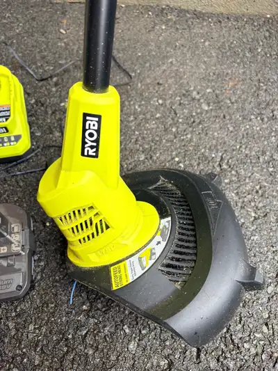 This Ryobi 18V cordless string trimmer is in excellent pre-owned condition and is ready to tackle yo...