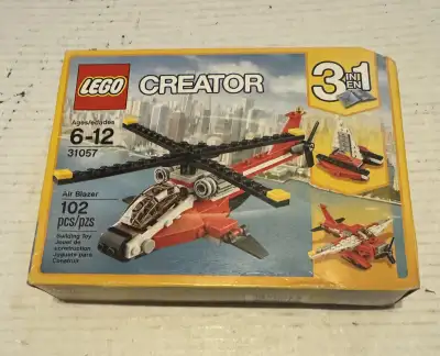 Take to the skies with this is new sealed box LEGO Creator Air Blazer set! This 3-in-1 model can be...