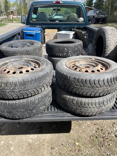 Set of 195/65/15 Winter Tires with Snowflake on 5x100 rims originally from a Corolla.