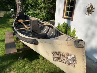 14 SportsPal aluminum canoe. Very stable and light weight. Includes Electric Motor, 2 paddles and mo...