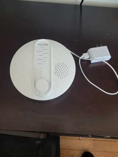 White noise machine. Works great. Sounds include: Forests, waves, animals, traffic, static, vacuum f...