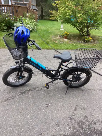 2023 e-bike like new for sale. Only 133 miles. Foldable step through model xp3.0. It includes a larg...