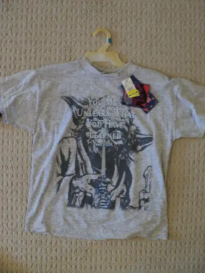 Star Wars Kids T-Shirt - Yoda Lucasfilm Size Medium Features Yoda's famous quote "You must unlearn w...