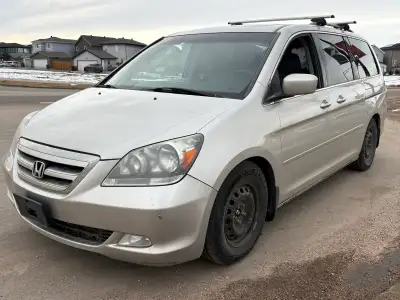 Beautiful condition Honda Odyssey, Touring trim. Active Title Power doors, two keys, winter tires. N...