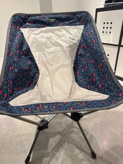 LL Bean kids camp chair. In good condition. It has one small hole from an ember. Folds dow into a sm...