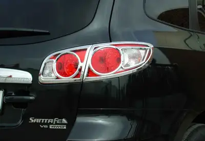 Chrome tail light covers for 2006-2008 hyundai santa fe. Brand new in box. (Box has generic picture....