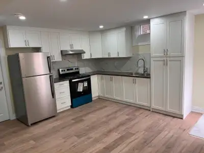$1500+Utilities FEATURES • Legal 1-Bedroom Basement Apartment • Plenty of outside light • Separate T...
