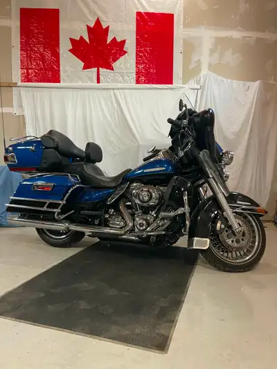2010 Harley Davidson Ultra Limited fully equipped with LED lights and custom trim. All hi-way miles...