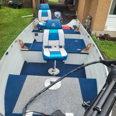 14' smokercraft boat in excellent condition with a live well .25 hp yamaha with electric start in gr...