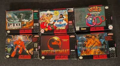 lot boites super Nintendo snes, View more