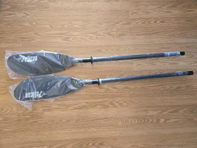 Never used, still in plastic. Injured my forearm and can't kayak. Aluminum 7.5 ft long
