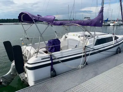 1999 Macgregor 26 X. Water ballasted, with road-ready trailer and safety equipment Roller furler and...