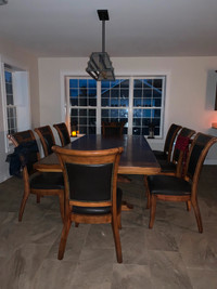 Ashley dining room set. 8chairs 10 ft table with 2ft extension