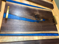 black walnut and blue epoxy charcuterie board and coaster set
