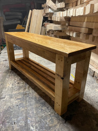 Entryway bench with slotted second shelf for wet boots and shoes