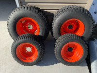 Tire & rims for bx Kubota tractor. 
