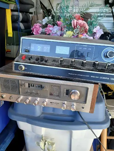 A couple base CB sideband radios as is they both did work and a new trailer dolly for your boat or u...