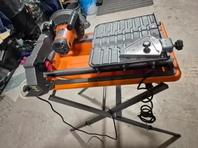 RIDGID 9-AMP 7-INCH PORTABLE WET TILE SAW WITH STAND, View more
