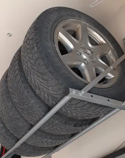We are selling 4 17-inch Jeep rims with snow tires. The rims are in very good condition, and the sno...
