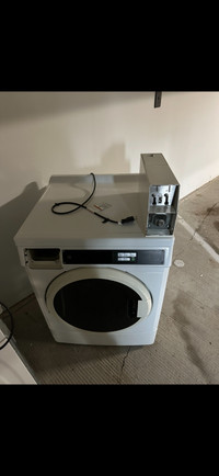 Coin operated washer
