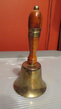 Vintage brass bell w/wood handle 7.5" high.