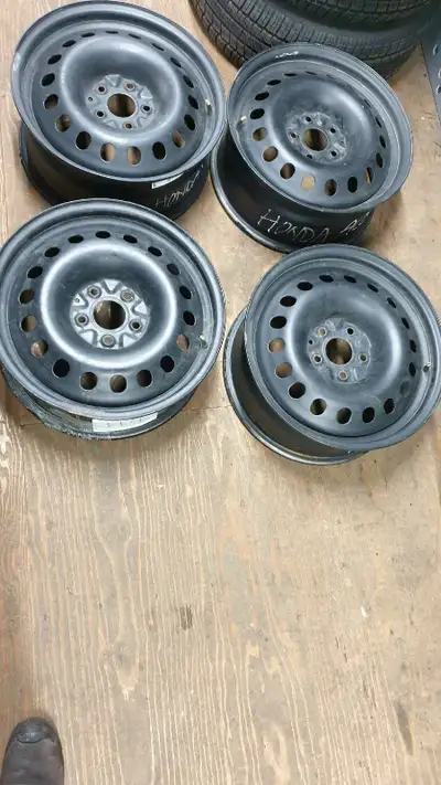 These are a set of four 17-inch steel rims, originally from a Honda Accord. These rims are used and...