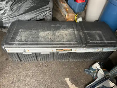 This is a Duratrunk truck storage box, perfect for keeping your tools and equipment secure. It's in...