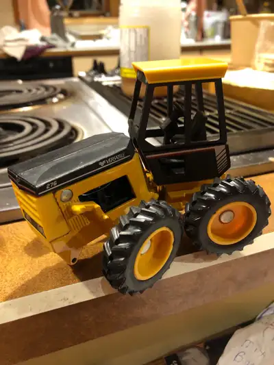 Mint new in box model 256 Versatile tractor—1/32 scale Asking 30.00. Obo Can deliver into Edm/ calga...