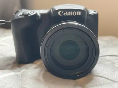 Elevate your photography with the black Canon SX400 IS. Featuring a 16MP sensor and 30x optical zoom...
