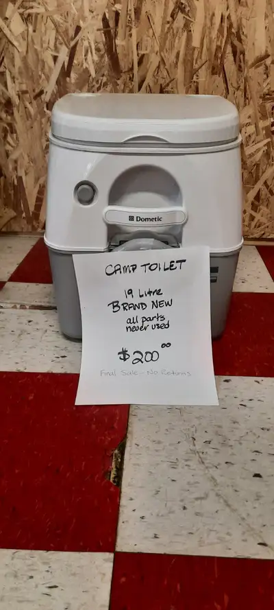 Camp toilet Brand new. Never used. All parts included.