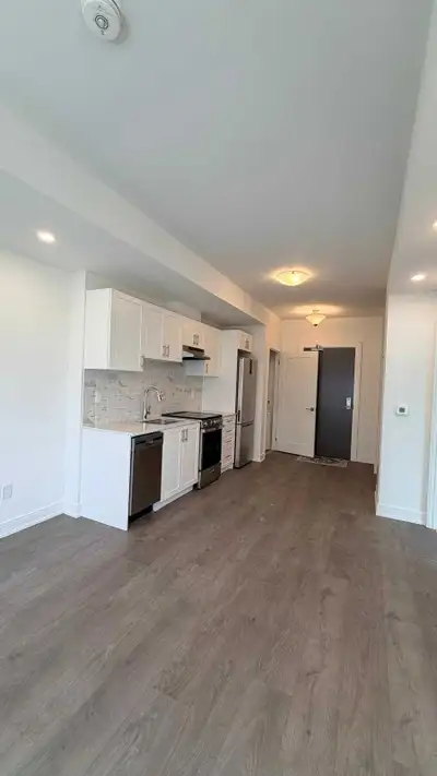 This modern, built 1-bedroom condo features a sleek open-concept layout with high-end stainless stee...