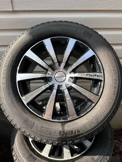 Michelin Latitude 235/60R17 winter tires with rims. Two different bolt patterns. 5 bolt by roughly 1...