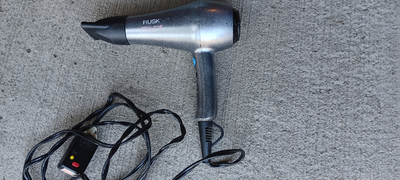 Fantastic barely used hair dryer. Rusk Brand