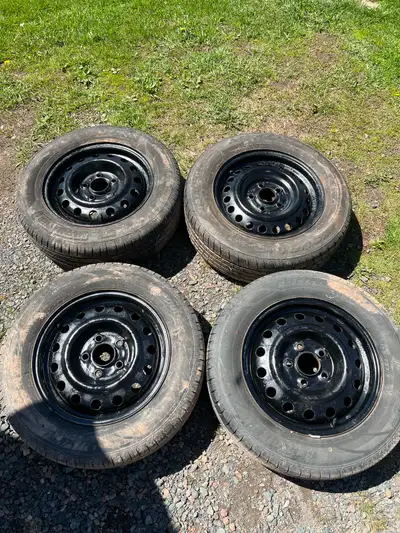 Set of 195/65-15 on 5x114.3 wheels 67.1cb two tires are new other two are used still good tread. Loc...