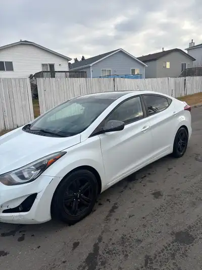 I am selling my white 2015 Hyundai Elantra, a reliable and stylish sedan with a 1.8L engine and auto...