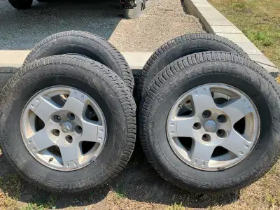 Four studded winter tires on 1/2 ton Dodge rims. Lots of tread. 275/70R 17 Text 250-919-7645 if inte...