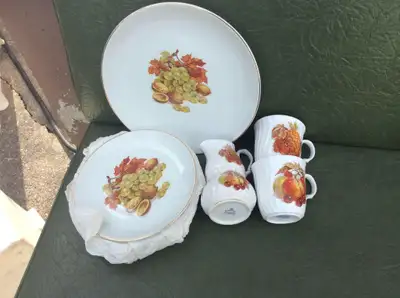 I am selling a fall motif dish set. Contains 1 cake plate, 6 dessert plates, cream and sugar and 2 m...